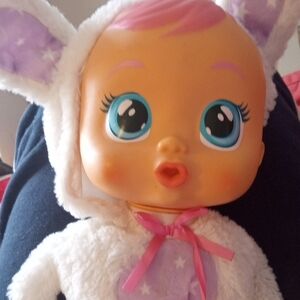 Adorable Plush Baby Doll with Purple Accents